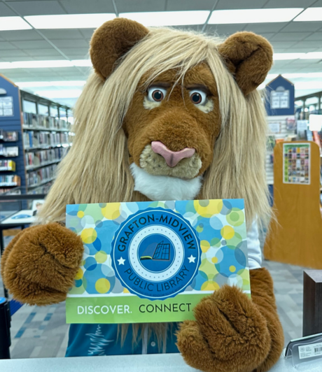 This picture shows Roary with the latest version of the Library's card.